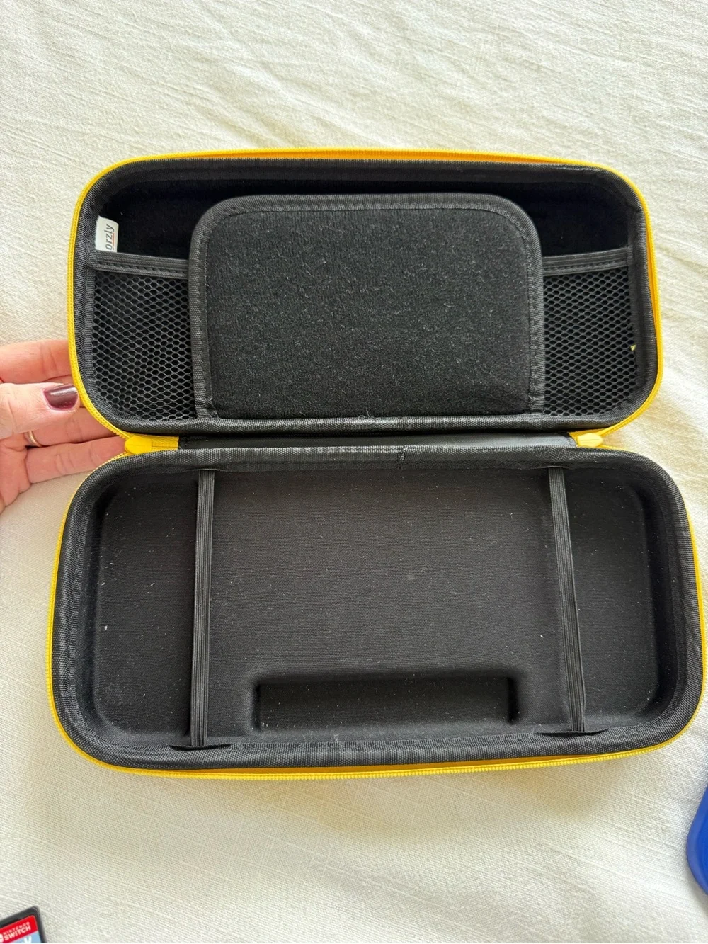 Nintendo Switch with Neon Blue & Neon Yellow Joy-Con and Yellow Carry Case